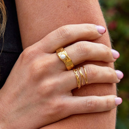 Infinity 18K Guld Twist Ring