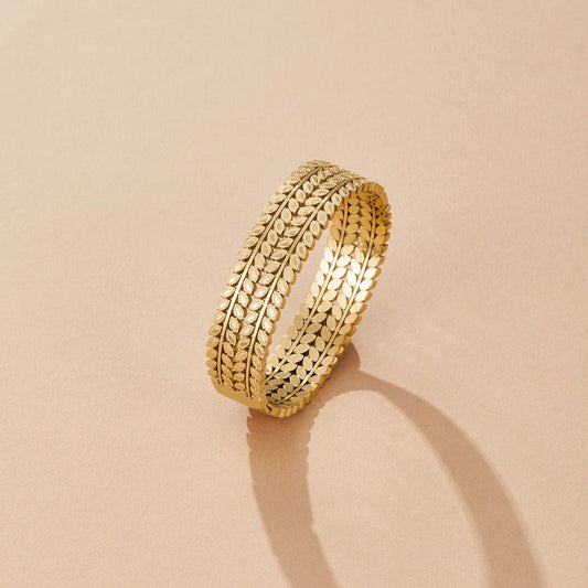 Lagdet Guldblad Bangle